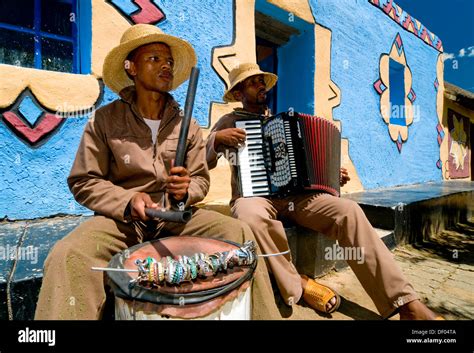 Traditional musicians playing an accordion and a drum, Basotho Stock Photo: 60854762 - Alamy