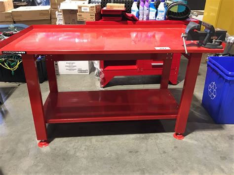 MAGNUM HEAVY DUTY STEEL WORK BENCH 5' X 32" WITH ATTACHED VISE - Able Auctions