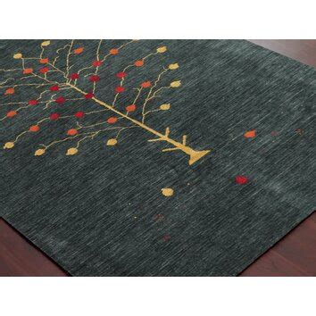 Nomadic Dark Green Area Rug | Wayfair