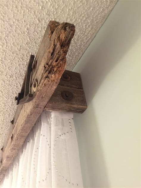 Window cornice from old extension ladder | Rustic window treatments, Window cornices, Wood valance