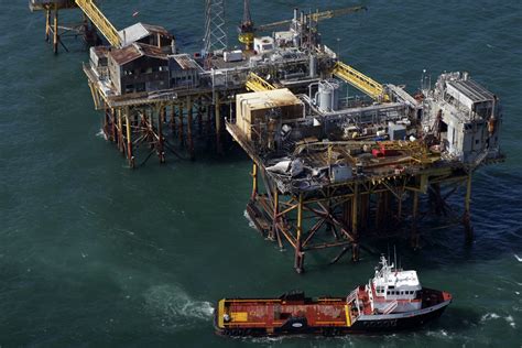 Search expands for worker missing after oil rig explosion - CBS News