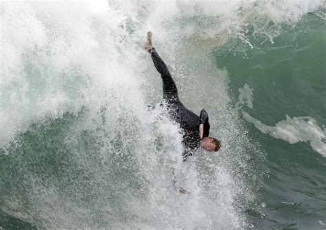 Photos: South swell churns up big waves at the Wedge in Newport Beach ...