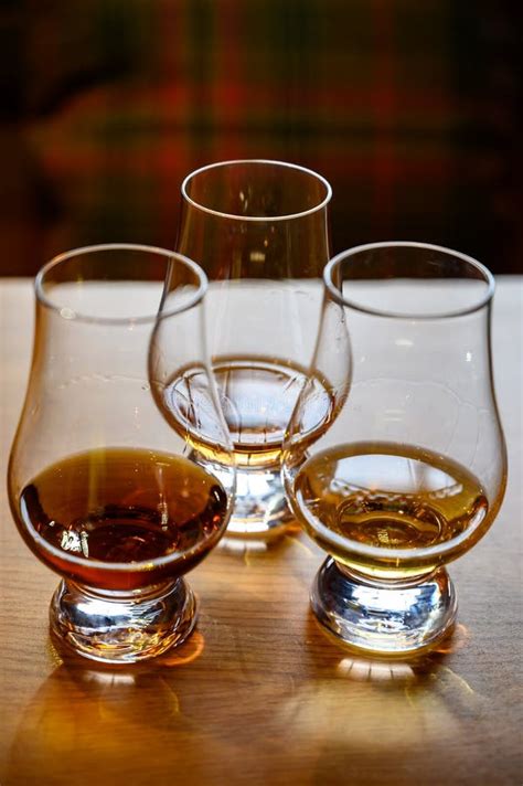 Scotch Whisky, Tasting Glasses with Variety of Single Malts or Blended Whiskey Spirits on ...