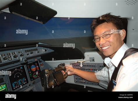 Trainee Pilot in cockpit simulator for commercial passenger jet Stock ...