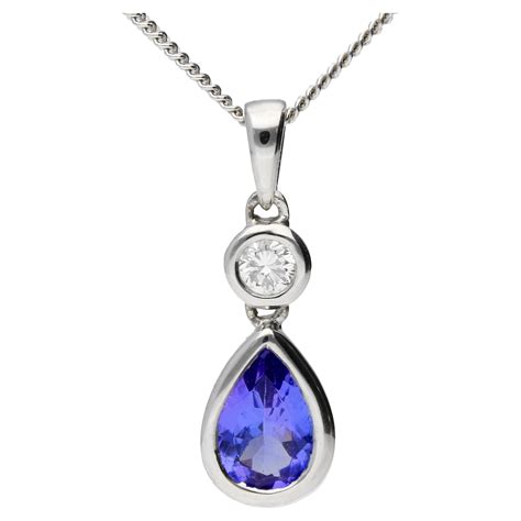 18ct White Tanzanite & Diamond Fancy pendant | Buy Online | Free Insured UK Delivery