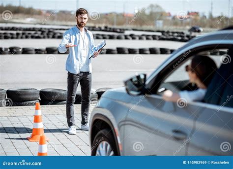 Instructor Teaching To Drive a Car on the Training Ground Stock Image - Image of learning ...