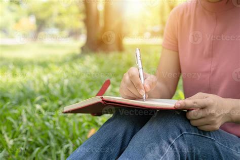 Person writing in a journal 2030843 Stock Photo at Vecteezy