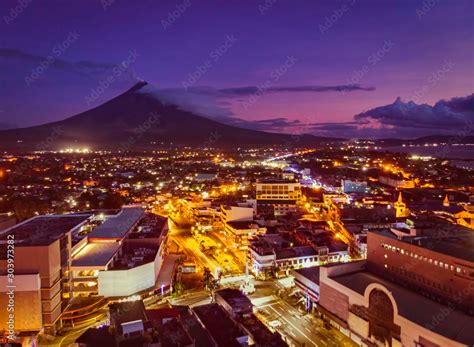 Mayon Volcano with Legazpi City lights in Legaspi City Albay ...