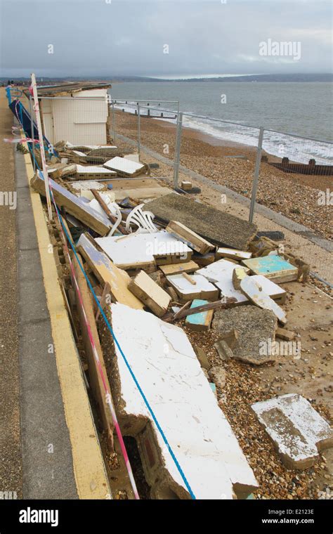 Smashed by storms, damaged beach huts. After the February 14 2014 Valentine’s Day Storm, Milford ...