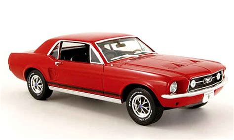 Red 1967 ford mustang coupe