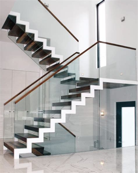 zig zag staircase with glass balustrade | Glass staircase, Staircase design, Stairs design modern