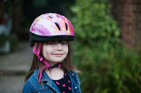 "Smiling Girl Wearing A Bike Safety Helmet" by Stocksy Contributor ...