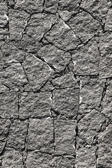 Textura de la roca volcánica negra de la pared de lanzarote, Canarias i ...