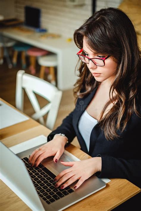 Girl Typing on Computer in Restaurant Stock Photo - Image of businesswoman, internet: 107951964