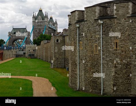 Tower Bridge is seen from various locations inside and outside The Tower of London in Central ...