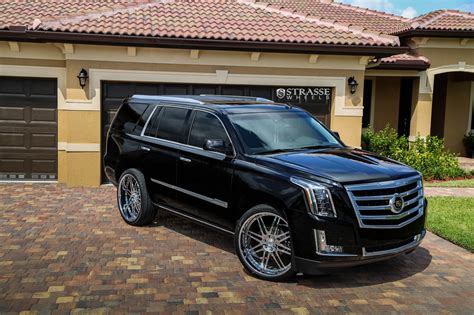 Black Cadillac Escalade Improved with Chrome Billet Grille and Chrome Strasse Wheels — CARiD.com ...