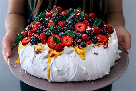 Mega Berry Pavlova with Lemon Curd & Fresh Mint | Pavlova recipe, Pavlova dessert, Pavlova toppings