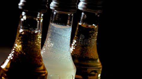 Liquor Alcohol Bottles Full of Different Color Liquids Stock Image - Image of colorful, bottles ...