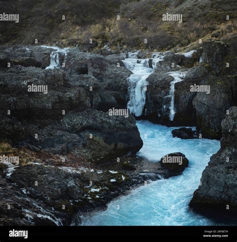 Icy waterfalls near Hraunfossar in Iceland Stock Photo - Alamy