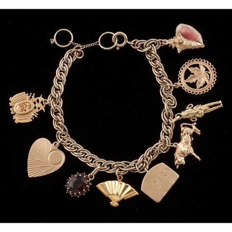 Gold-filled Charm Bracelet with Gold Charms | Cowan's Auction House ...