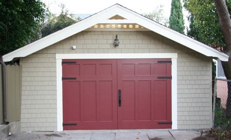 Fiberglass Swing Out Garage Doors | Non-warping patented wooden pivot door, sliding door, and ...