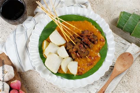 Sate Padang. Spicy beef satay from Padang, West Sumatra. Served with ...