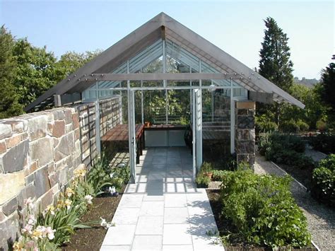 Roof Garden House with a Beautiful Rooftop Greenhouse