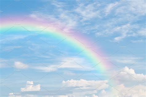 rainbow in blue sky after the rain | Nature Stock Photos ~ Creative Market