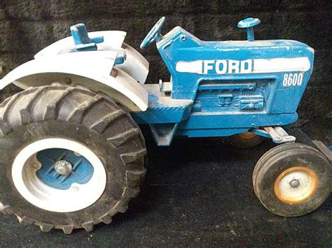 Sold Price: Vintage Blue Ford Tractor - Invalid date MST