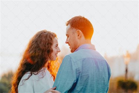 Young Couple Hug In Sunset - Stock Photos | Motion Array