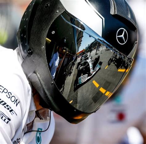 The Mercedes pit crew helmets are way too cool - Car | Helmet, Cool cars, Race car mirror