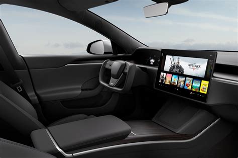 The redesigned Tesla Model S interior swaps in a steering yoke