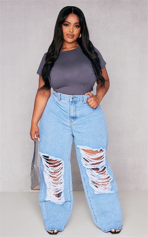 Plus Light Blue Distressed Wide Leg Jeans | PrettyLittleThing CA