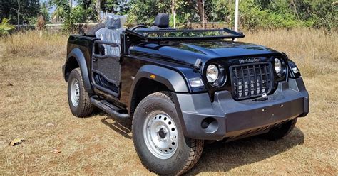 Mahindra Thar 4X4 SUV modified as an open-top Willys jeep - Car Fix Guru