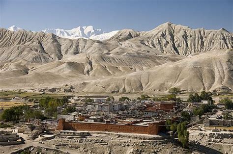 Nepal: Mustang 10- Lo Manthang, city from N with Annapurna Himal beyond