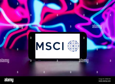 In this photo illustration, the MSCI logo is seen displayed on a mobile phone screen Stock Photo ...