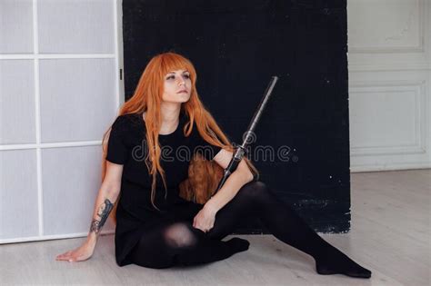 Beautiful Woman Anime Cosplayer with Red Hair with Japanese Sword Stock Image - Image of horror ...