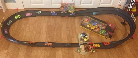 Disney Cars Piston Cup 500 Track Set With 22 Cars & Next Gen Racers ...