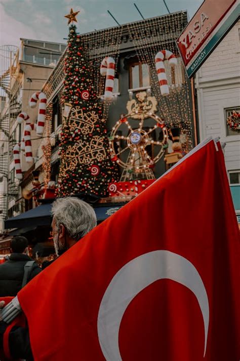 Christmas Decorations on a Store and a Turkish Flag · Free Stock Photo