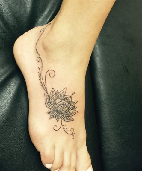 Lotus flower foot tattoo | Sunflower foot tattoos, Tattoos for women ...