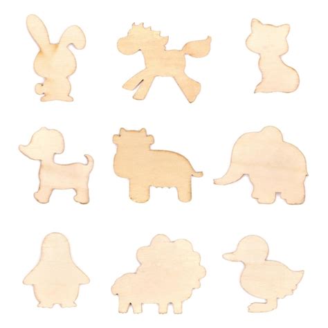 Premium Photo | Wooden toys with animal figures on white background