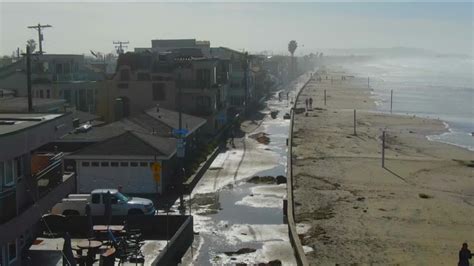 Rushing waves flood coastal areas of San Diego County after a powerful storm drenched California ...