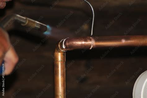 soldering copper pipework Stock Photo | Adobe Stock