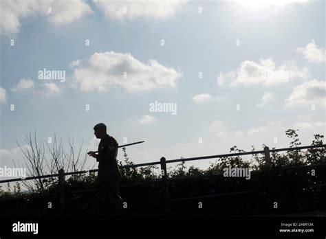 Silhouette of soldiers marching Stock Photo - Alamy