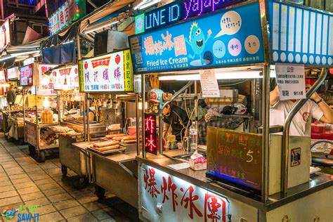 TAIPEI, TAIWAN - JULY 11: This is a street in Shilin night market a ...