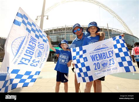 Carlisle United fans pose for photographs outside the stadium before the Sky Bet League Two play ...