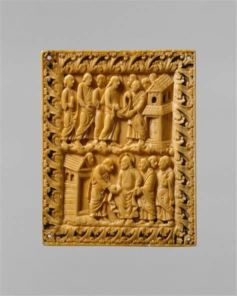 an intricately carved panel with figures on it