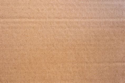 Premium Photo | Close up brown cardboard paper box texture and background.