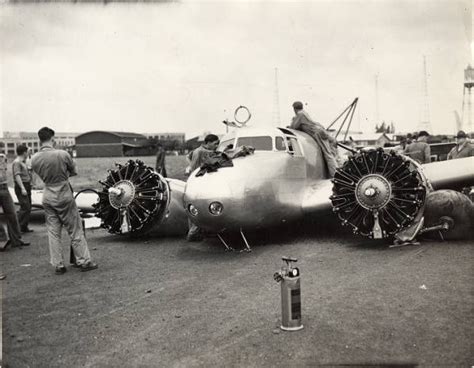 Amelia Earhart's heavily damaged Lockheed Electra 10E Special, NR16020, after a ground loop on ...