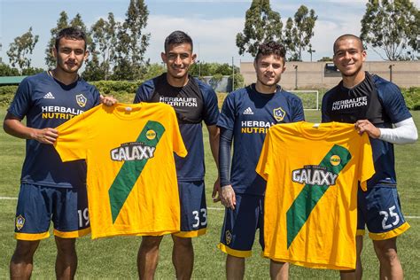 Photo Gallery: LA Galaxy players show off the Galaxy Throwback Night promotional shirts | LA Galaxy